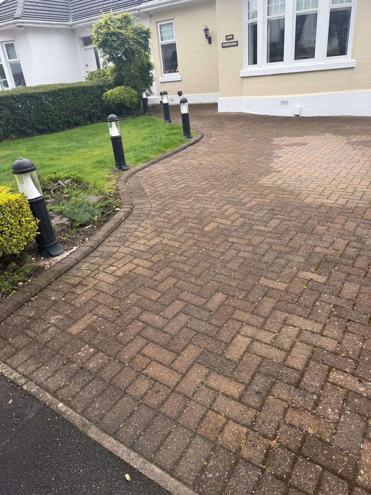 Driveway pressure wash before